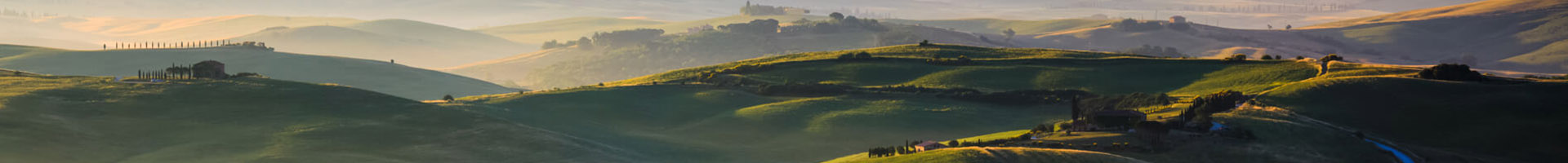 Soluciones de Asesoramiento Especializado de Banca Privada - Paisaje con campo y montaña de fondo Soluciones de Asesoramiento Especializado de Banca Privada - Paisaje con campo y montaña de fondo